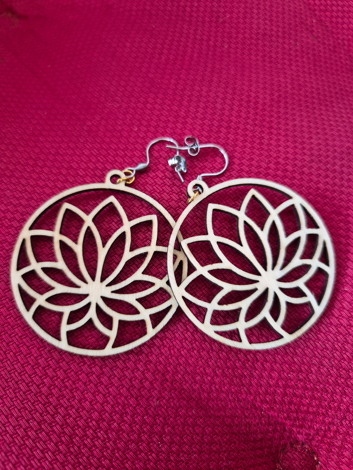 Boucles bois arabesques